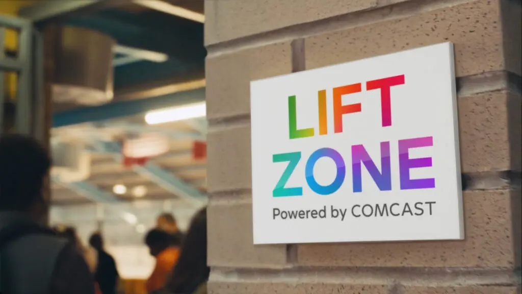 Exterior image of a Comcast Lift Zone with Lift Zone branding on the wall.