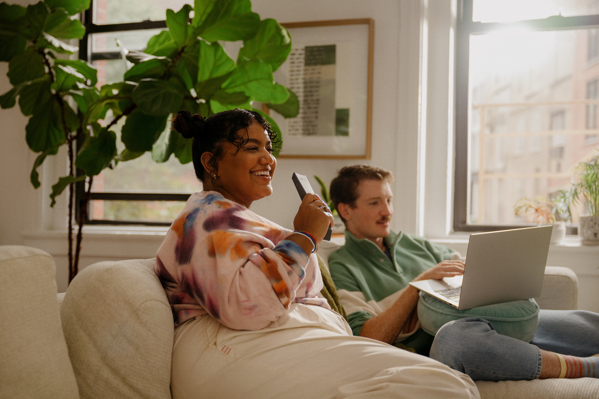 Person using Xfinity Voice Remote